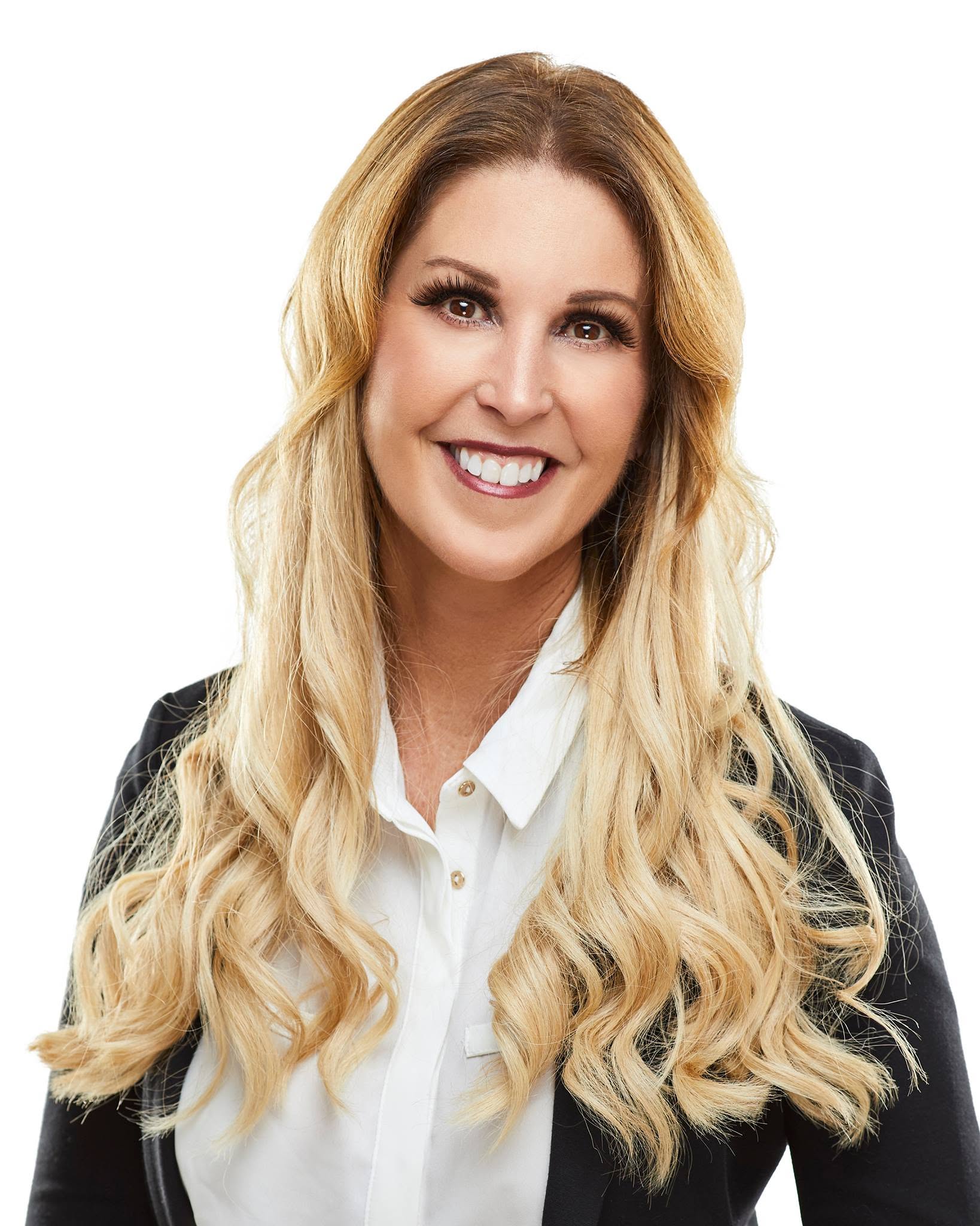 Leanne Tourney, top-producing real estate agent coach focused on production, team building, family partnerships, brand growth, leadership, and accountability.