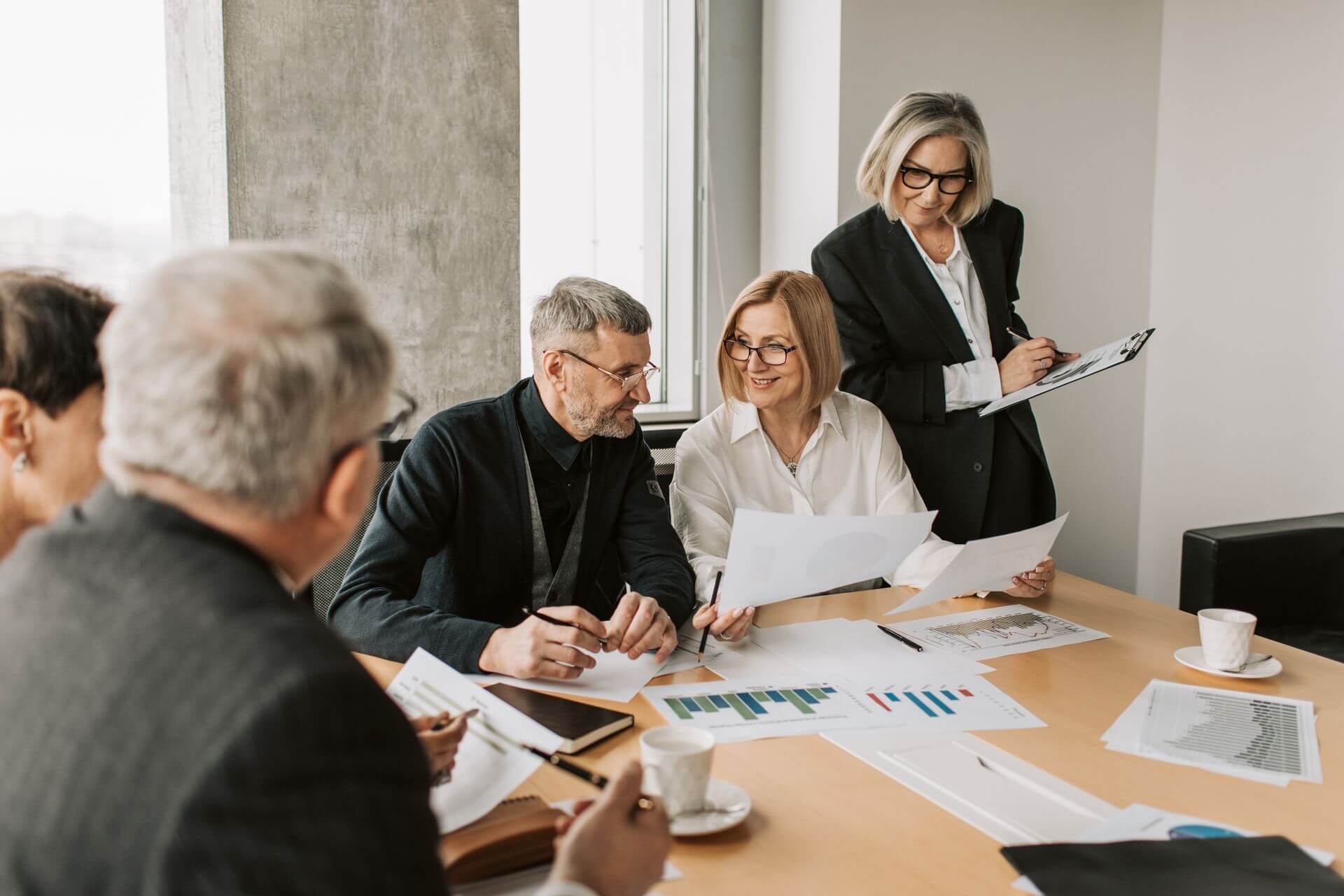 Scaling Your Real Estate Business free guide by Coach Ken International, helping real estate team leaders create a business plan with vision, values, ideal customers, KPIs, and growth milestones.